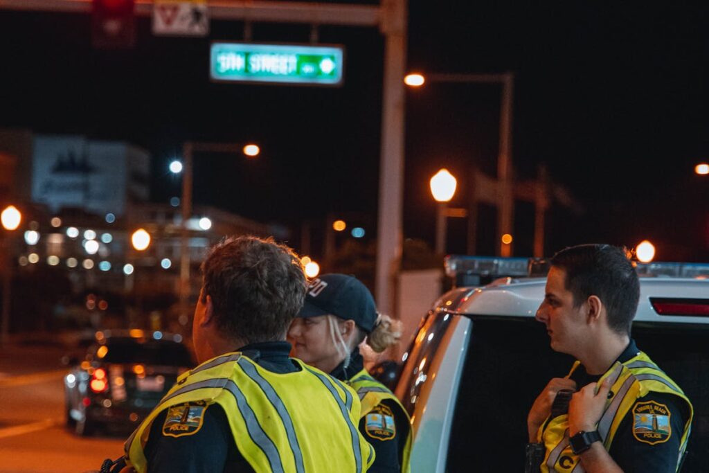 Traffic Police Officers Standing on the Roadside